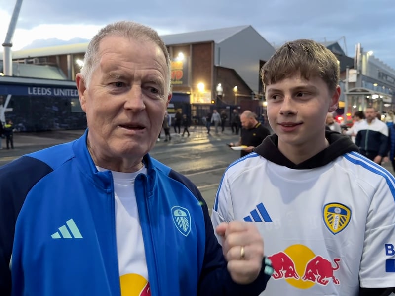Two generations enjoy the moment.