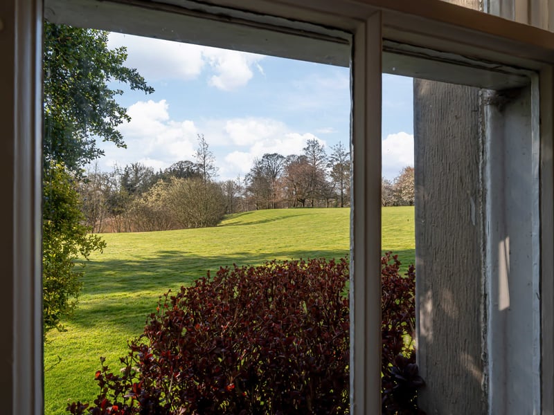 A charming private courtyard garden adds a tranquil retreat, while extensive communal grounds surround the castle complete with ponds, lawns, woodlands, and a summer house