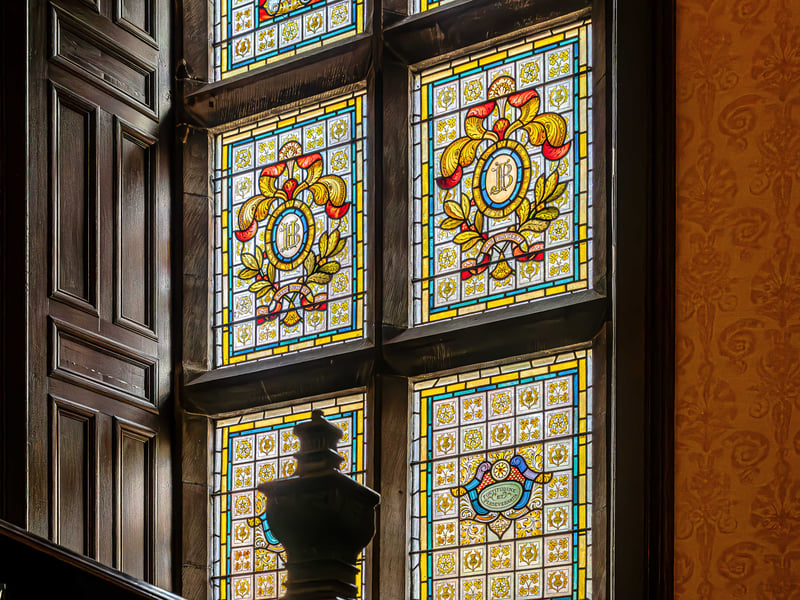 There are a range of period features in the property, including an ornate fireplace and large windows that frame views of the castle’s well-groomed gardens