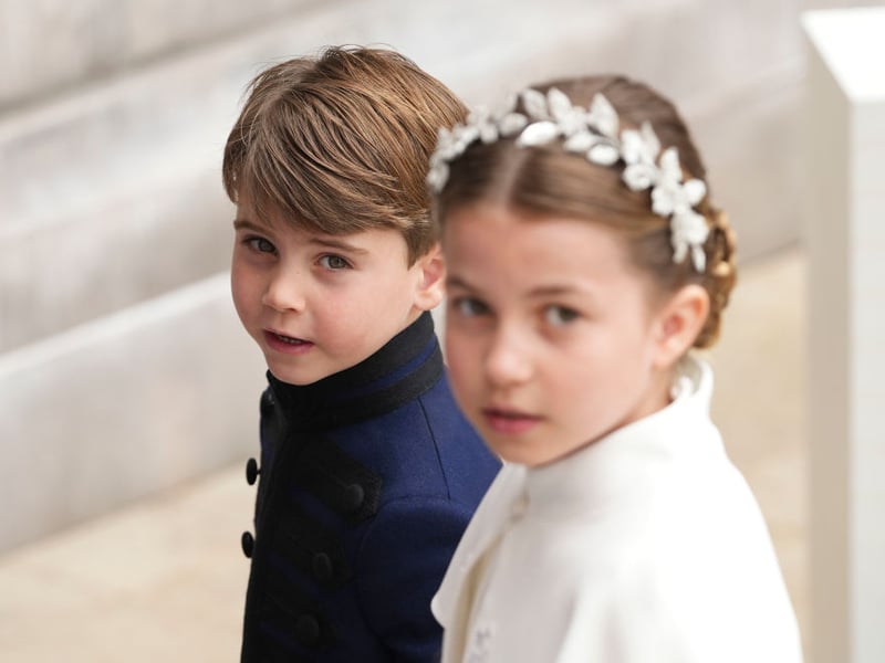 A beautiful photo of Prince Louis and Princess Charlotte at the Coronation of their grandfather, King Charles