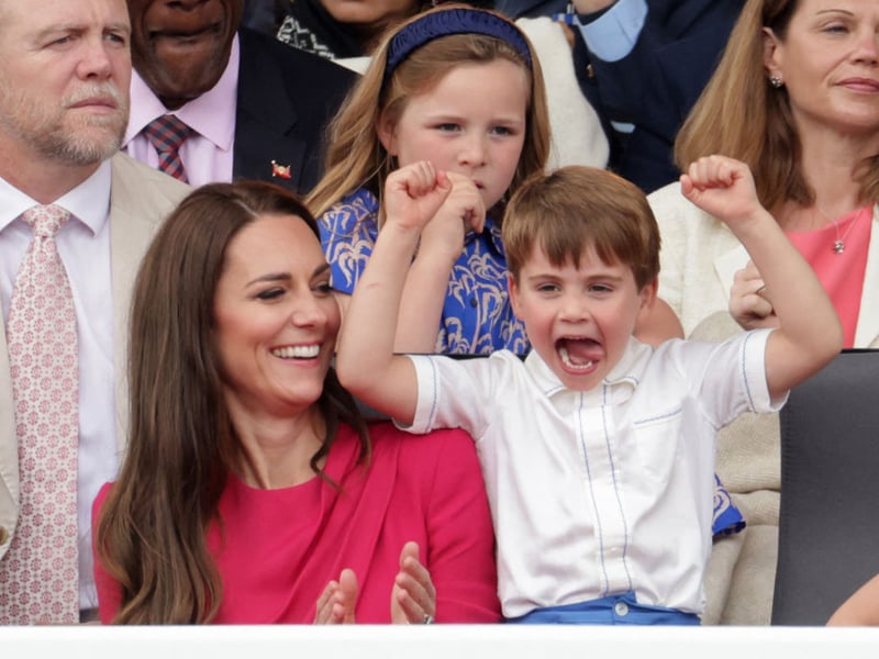 Princde Louis reacts with his mother, Catherine, Princess of Wales during the Platinum Pageant in London on June 5, 2022