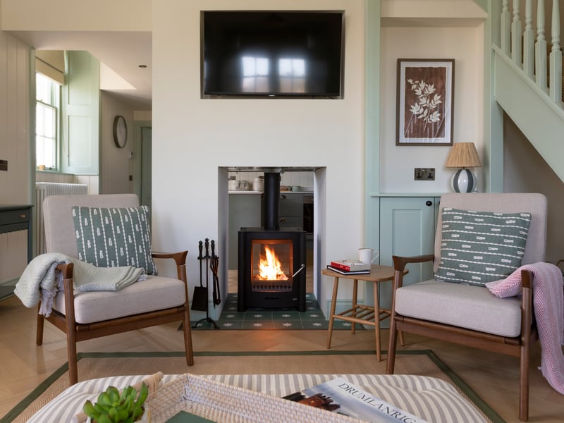 Retaining their Category B listed status, these properties are an integral part of the Estate’s history, seamlessly blending heritage with contemporary comforts (including this cosy wood burning stove).