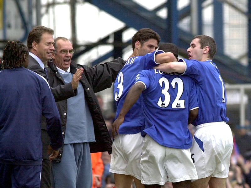 Alain Perrin and Joe Jordan celebrate with Stefanovic and Griffin after LuaLua netted Pompey's fourth.