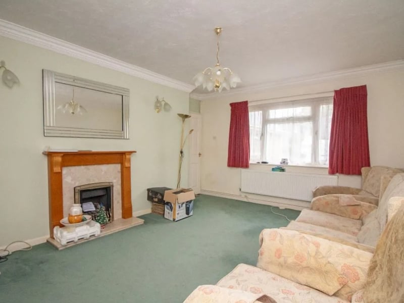 This home comes with three bedrooms, two bathrooms and three reception rooms.