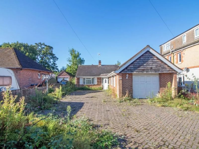 The listing says: "No forward chain is offered with this greatly extended three bedroomed detached bungalow in Cowplain offering huge potential occupying a generous plot."