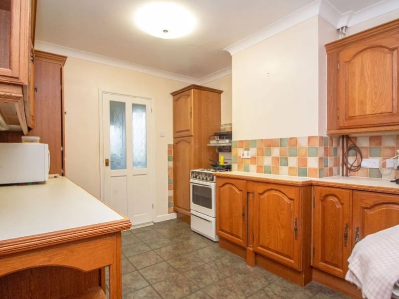 This home comes with three bedrooms, two bathrooms and three reception rooms as well as a large parking area at the front of the property.