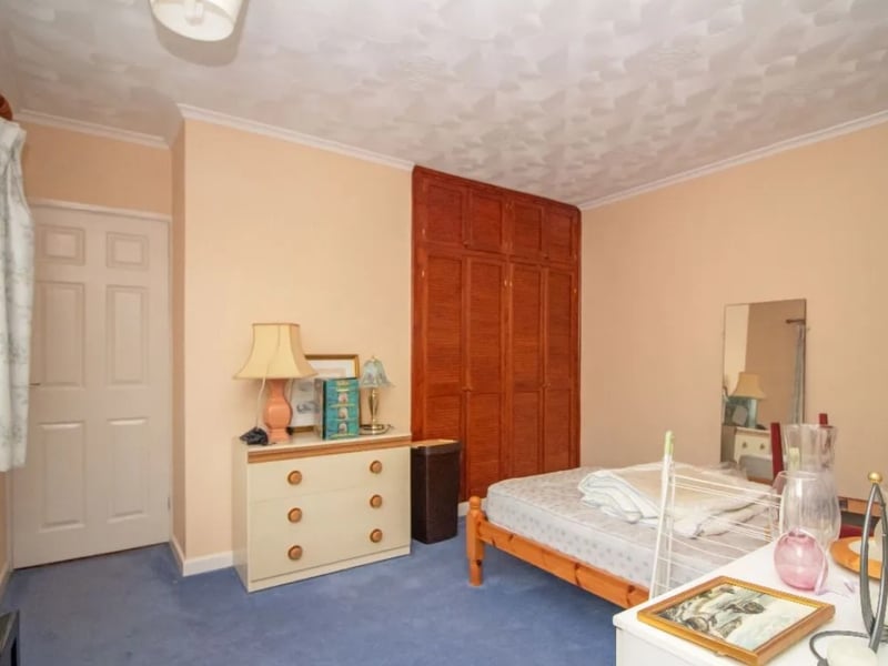 The listing says: "No forward chain is offered with this greatly extended three bedroomed detached bungalow in Cowplain offering huge potential occupying a generous plot." 