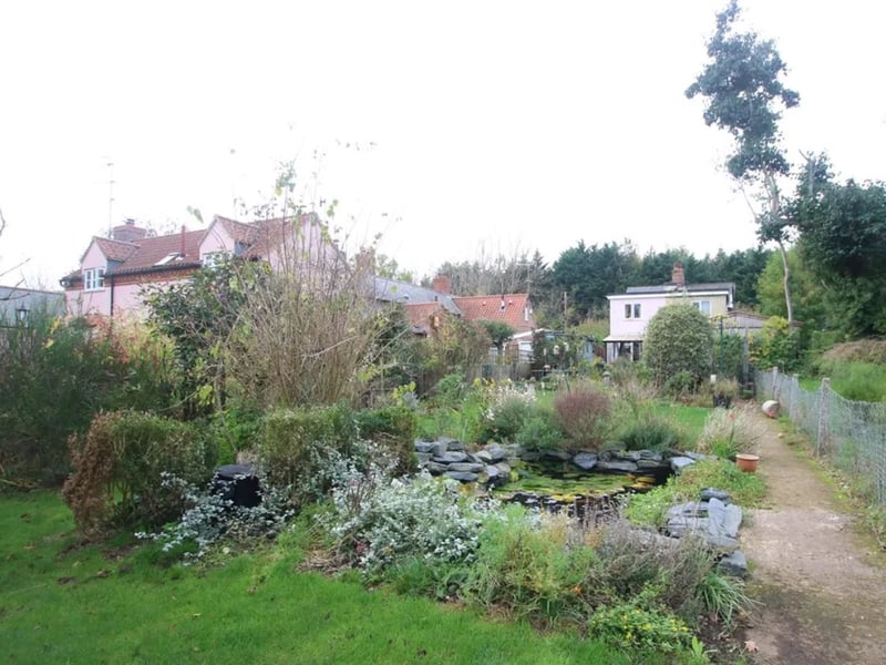This three-bedroom cottage on The Common, in Little Blakenham, Ipswich, comes with a huge garden, stretching back more than 200 feet. It includes an ornamental pond, lawned areas, a small orchard and a workshop. It's listed for sale with Hamilton Smith, for offers over £299,995.