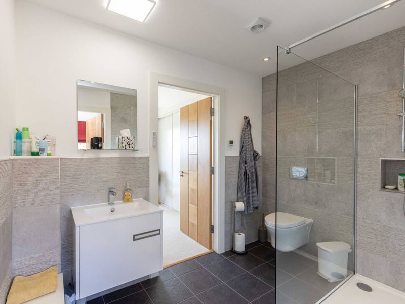 The second en-suite is also modern and a good size, with an eye catching shower cubicle.