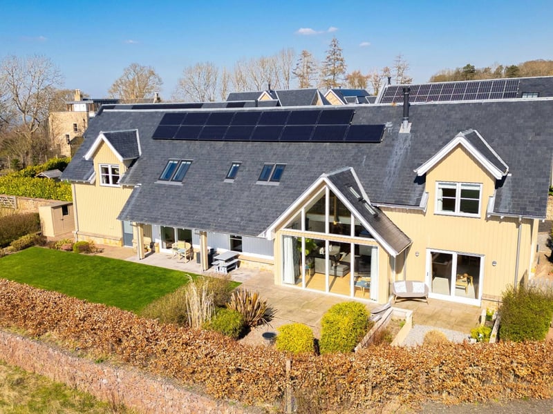 The gardens wrap around the house and have been well-developed to include a large ornamental lawn, patio space for entertaining, and a vegetable patch.