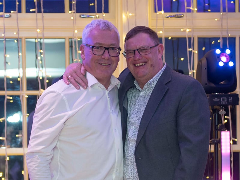 Chair of the Lancashire Mind board, Michael Jameson, left, with raffle winner Alan Bradshaw