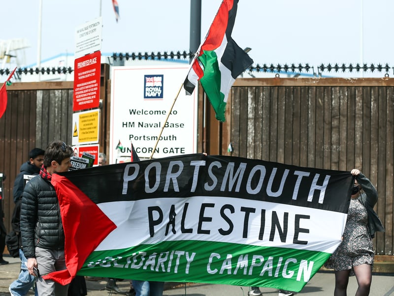 Protesters gather outside Unicorn Gate at HMNB Portsmouth, the gateway that leads to Portsmouths Main Naval base and one of BAE Systems sites