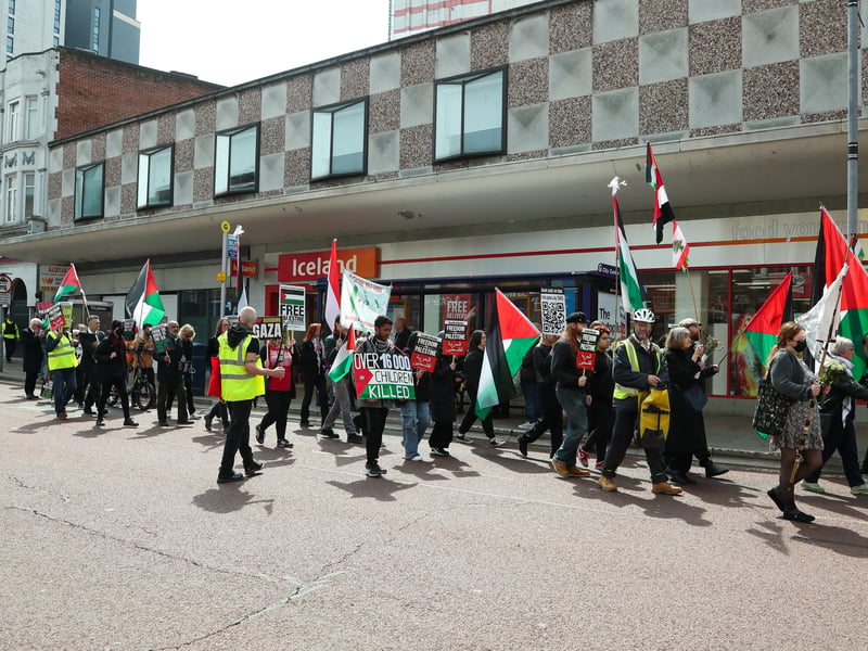 Protesters march through the city centre