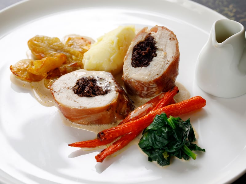 Named after the castle of the same name in Aberdeenshire, Balmoral chicken is a popular recipe among Scotsman readers of chicken breast stuffed with haggis, wrapped in bacon and served with either a whisky or peppercorn sauce.