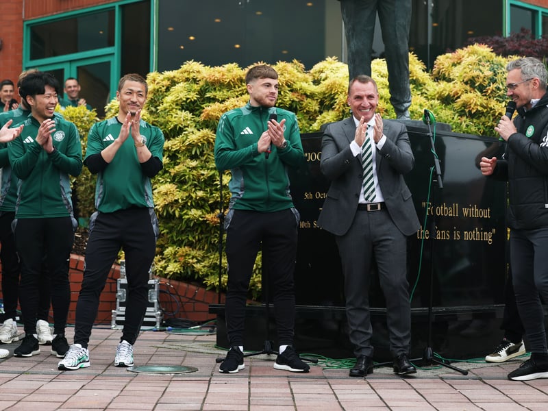 Celtic's most decorated player James Forrest and head coach Brendan Rodgers celebrate with fans at Celtic Park.
