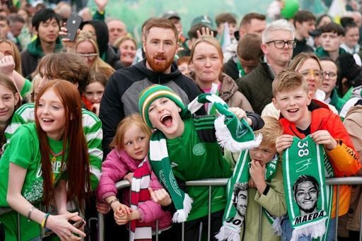 Celtic fans celebrate victory in the Premiership outside Celtic Park, Glasgow.