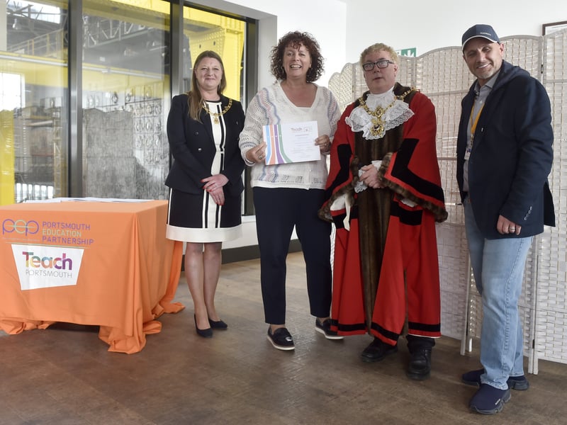 Pictured is: School staff being presented with their certificates.
Picture: Sarah Standing (240425-2210)