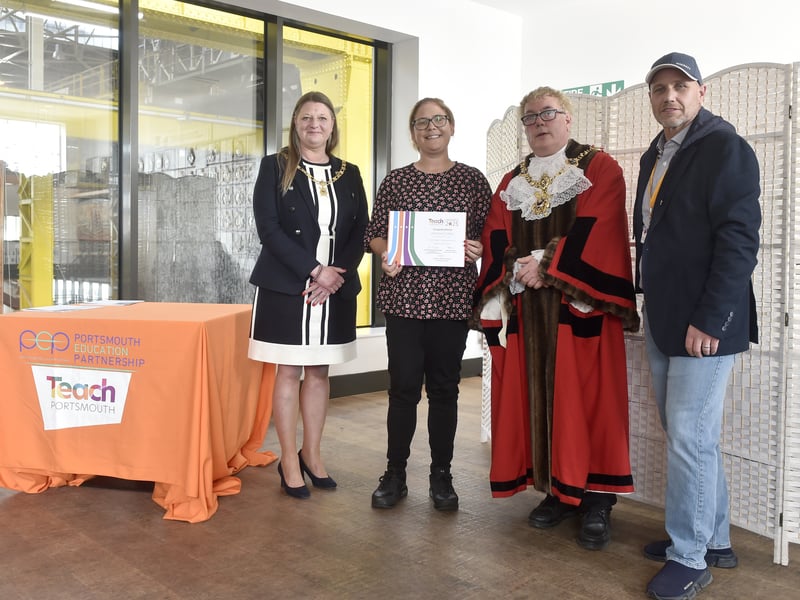 Pictured is: School staff being presented with their certificates.
Picture: Sarah Standing (240425-2218)