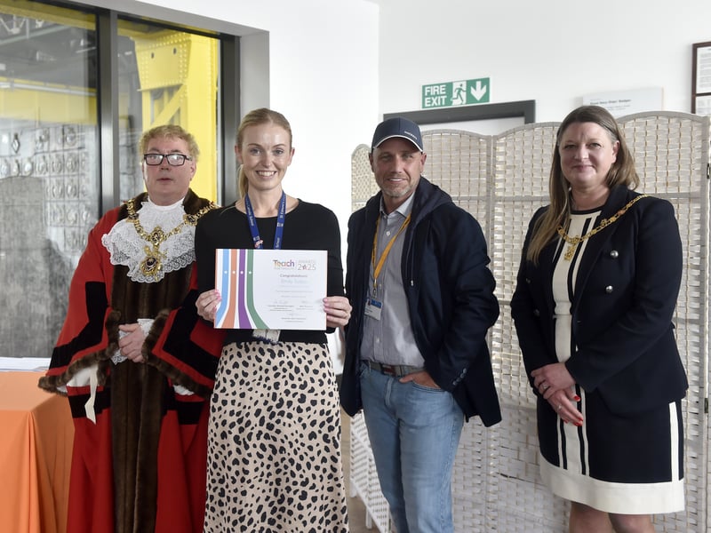 Pictured is: School staff being presented with their certificates.
Picture: Sarah Standing (240425-2206)