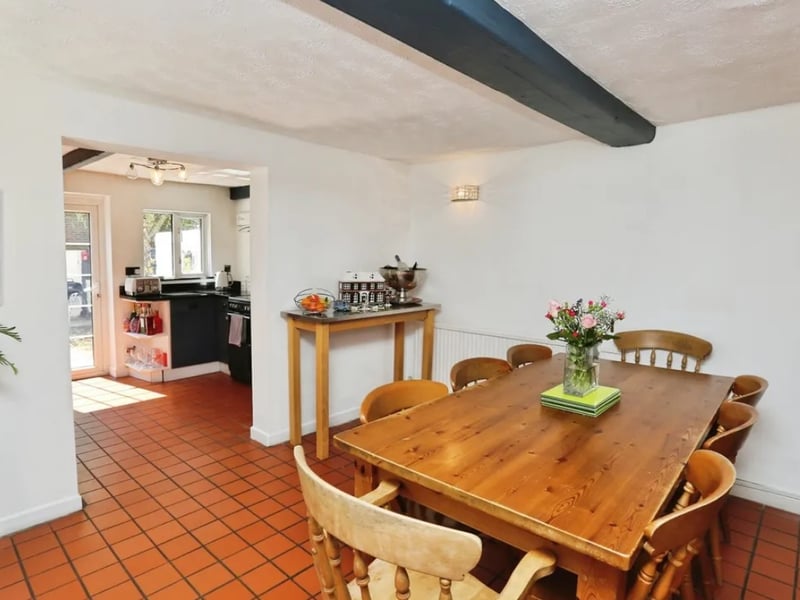 The listing says: "This deceptively spacious home combines traditional features with modern comforts, making it perfect for families and those seeking a serene lifestyle."