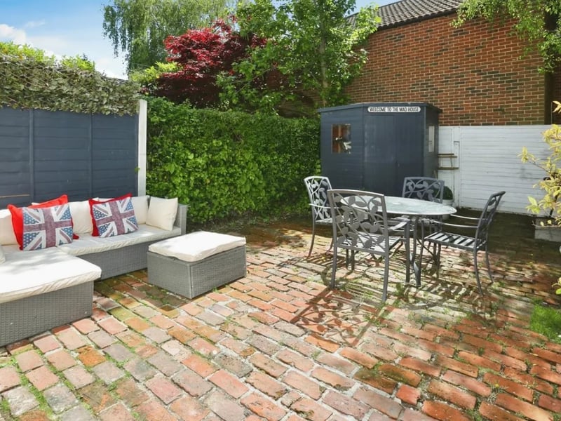 The listing says: "Welcome to this charming four-bedroom character property nestled in a picturesque village location, ideally situated close to local amenities and the beautiful Stokes Bay."
