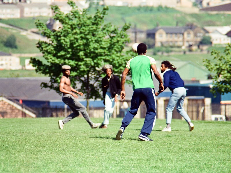 Michael White, Curly Roots, Pikey D and friends playing football on Green Lane field.