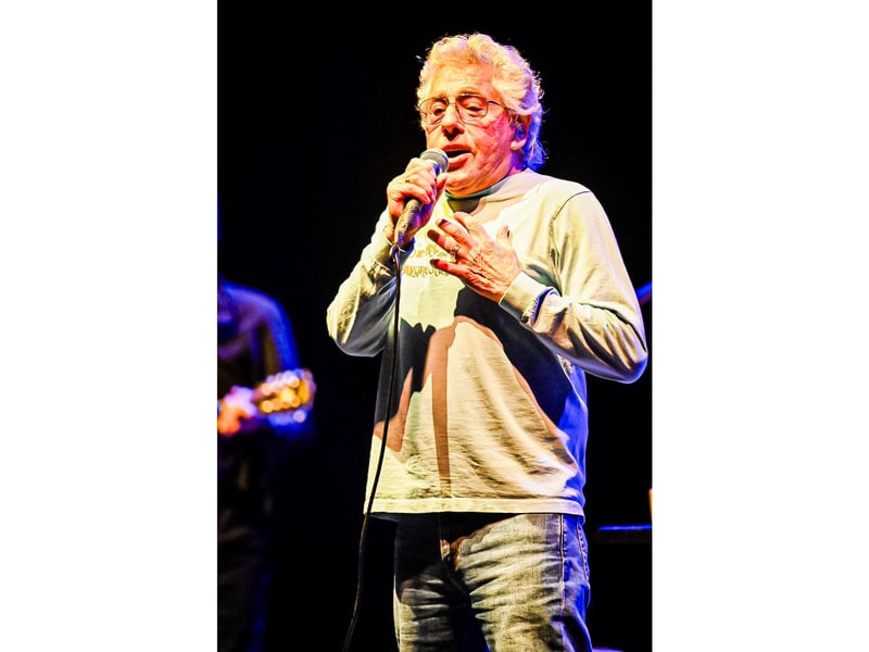 Roger Daltrey opened the set with 'Let My Love Open The Door'.
