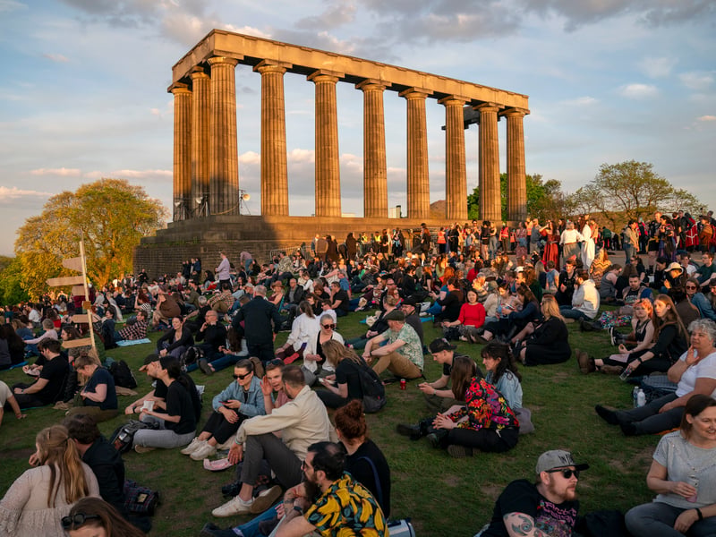People enjoyed the sunshine before the procession.