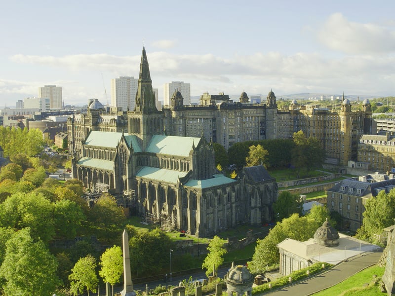 The Necropolis, Glasgow's Victorian City of the Dead, is a vast and grand cemetery modeled on Père-Lachaise in Paris. Described as one of the most significant cemeteries in Europe, it is a major visitor attraction and patrolled by Park Rangers. Pictured is The Necropolis alongside Glasgow Cathedral. It averages at 4.5 stars and earned 3,652 reviews on Trip Advisor.