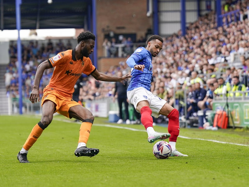 Former Fratton favourite Abu Kamara tries to stop current favourite Josh Murphy.