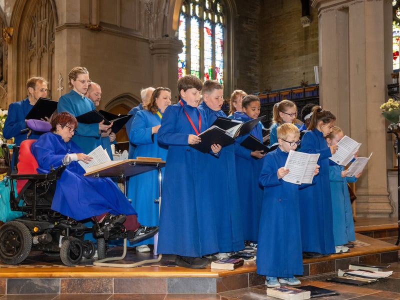 Thousands of people descended to St Marys Church on Bank Holiday Monday for its VE Day celebrations. 

Pictured:  The choir perfmoring

Pictures: Alex Shute