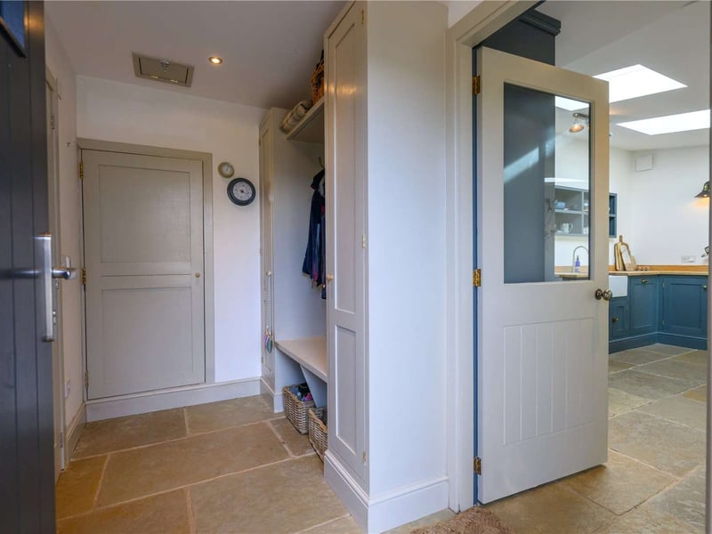A boot room off the kitchen is ideal for extra storage.