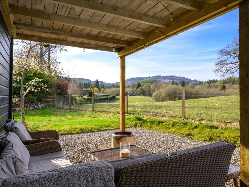 The terrace has stunning views of the countryside.