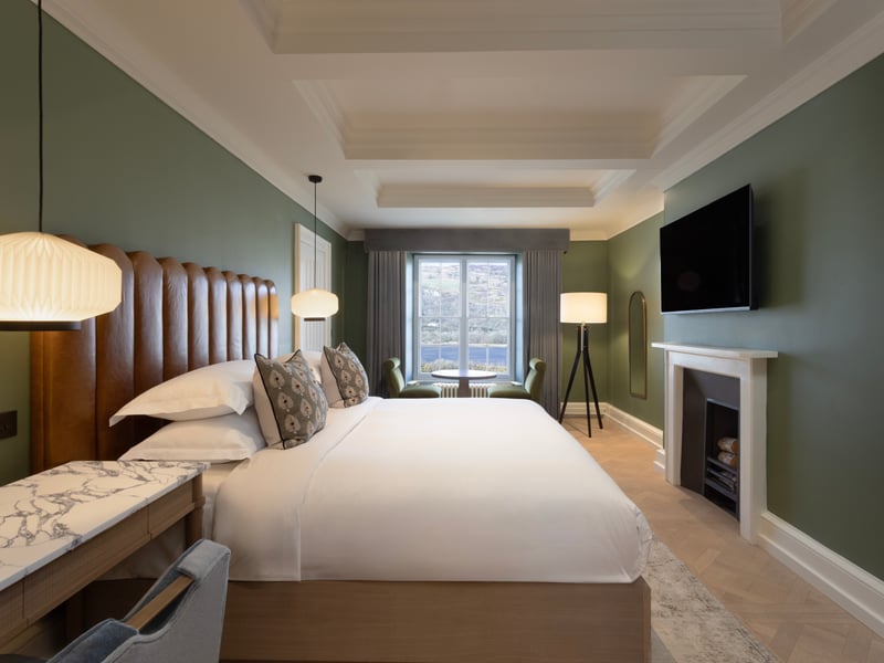 Seven categories of guest rooms and suites have been designed to reflect the character of Mar Hall, including this deluxe suite.