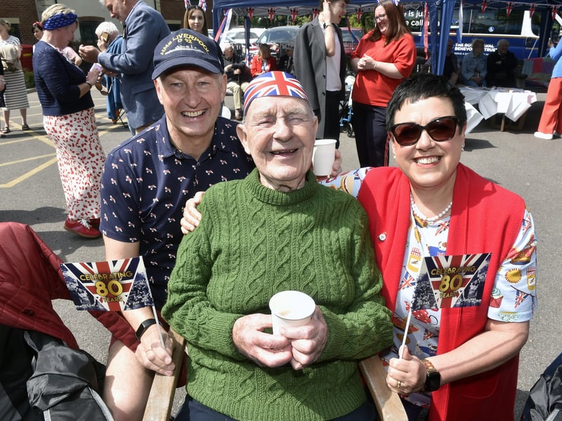 Admiral Jellicoe House in Southsea, run by Royal Naval Benevolent Trust, has held a VE Day celebration.

Pictured is: Norman Gott (96) with his son Stephen and daughter-in-law Alison who both served 32 years in the Royal Navy

Picture: Sarah Standing (080525-6294)