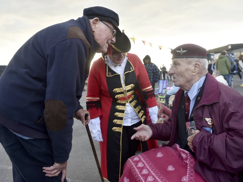 VE Day 80th anniversary commemorations took place at The Ferryboat Inn, Hayling Island. 

Pictured:John with town crier Rosy Raines meeting John Newman, 25 years in the 1st Battalion Parachute Regiment

Picture: Sarah Standing (080525-6361) 