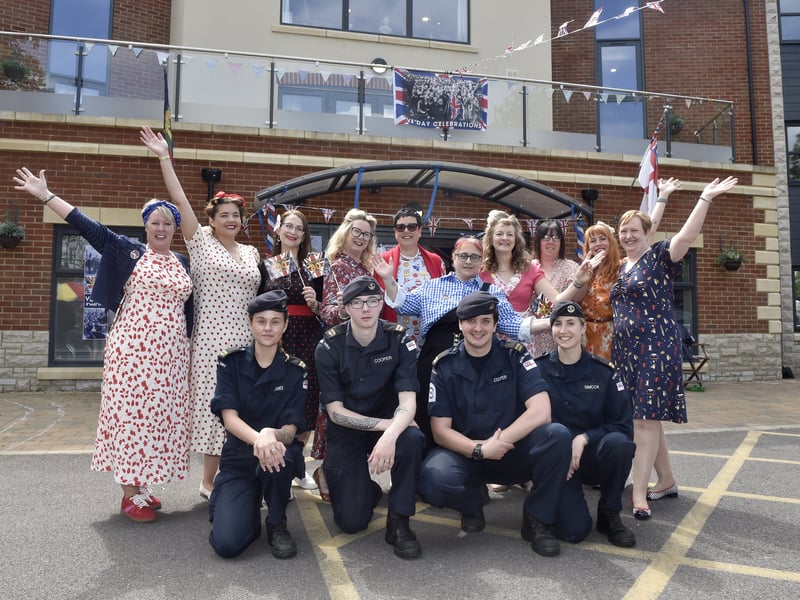 Admiral Jellicoe House in Southsea, run by Royal Naval Benevolent Trust held a VE Day celebration at the house.

Pictured is: Staff from Admiral Jellicoe House with sailors from HMS Nelson. 

Picture: Sarah Standing (080525-3006)