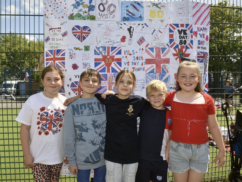St John's C of E Primary School in Grove Road, Gosport, held a VE Day celebration for the 80th anniversary. 

Pictured is: (l-r) Bella (9), Noah (9), Laura (8), Jack (8) and Amelie (9)

Picture: Sarah Standing (090525-6610)