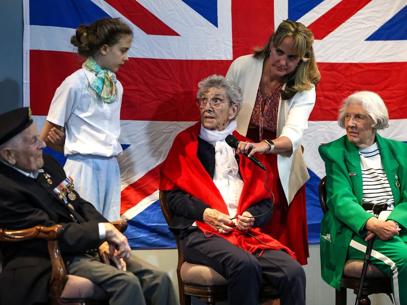 The Portsmouth Historic Dockyard hosted a VE day event  where veterans were interviewed about their wartime memories. 

Pictured: Charlotte, 12, asked a question of, from left, Robin Boodle who was an able seaman in the Battle of The Atlantic, Mabel Kidney of the WRNS and Dorothy Walsh who worked at Bletchley Park with Alan Turing on the Enigma machine. 

Picture: Chris Moorhouse (100525-33)