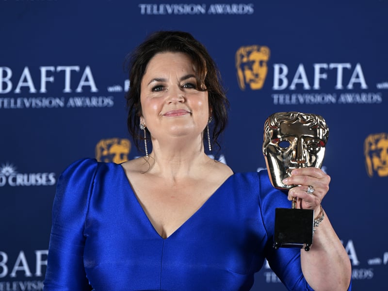 Ruth Jones poses with the Female Performance in a Comedy Programme Award for 'Gavin & Stacey: The Finale' inside the Winners Room at the 2025 BAFTA Television Awards.