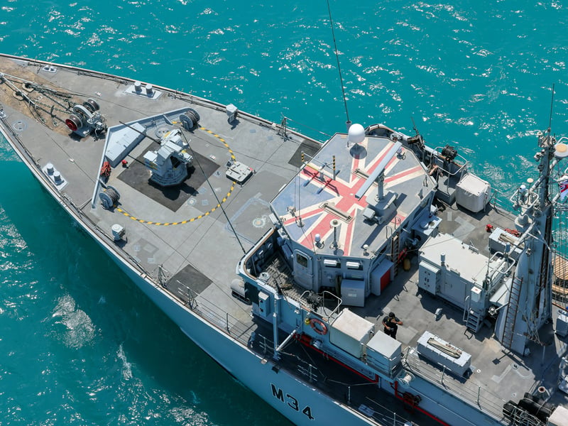 Portsmouth-based Royal Navy minehunter HMS Middleton joined forces with American, Kuwaiti and Iraqi forces to conduct a rescue exercise in the Gulf. Pictured: A close-up aerial shot of HMS Middleton's bow and bridge
