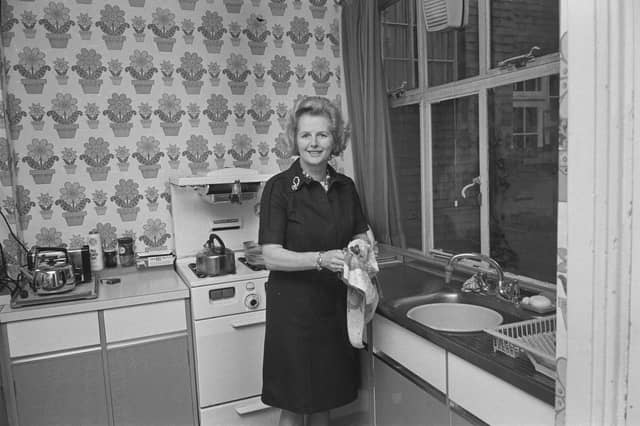 Patterned wallpaper was everywhere during the 1970s, including in the kitchen of future Prime Minister Margaret Thatcher, then education secretary, pictured here during the 1974 general election campaign