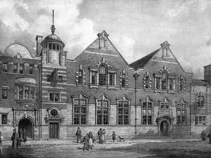 An undated photo-tinted drawing of the public baths and free library. This drawing was hung in the Royal Academy. 