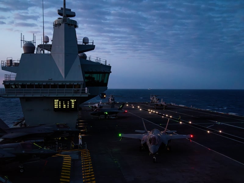 Pictured: The flight deck of HMS Prince of Wales during night flying operations for Exercise Med Strike during Operation Highmast as part of the UK Carrier Strike Group 2025.