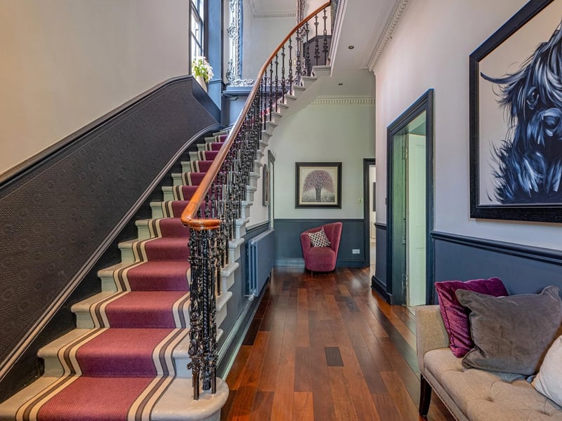 The hallway with traditional staircase