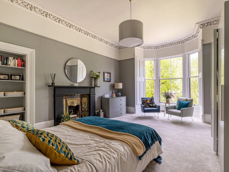 One of the five bedrooms, which has an en suite.
