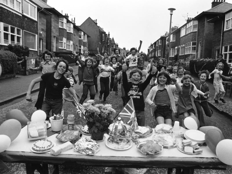 The children of Edinburgh's Glenlee Gardens, Willowbrae, hold a street party to celebrate the Queen's Silver Jubilee in May 1977.