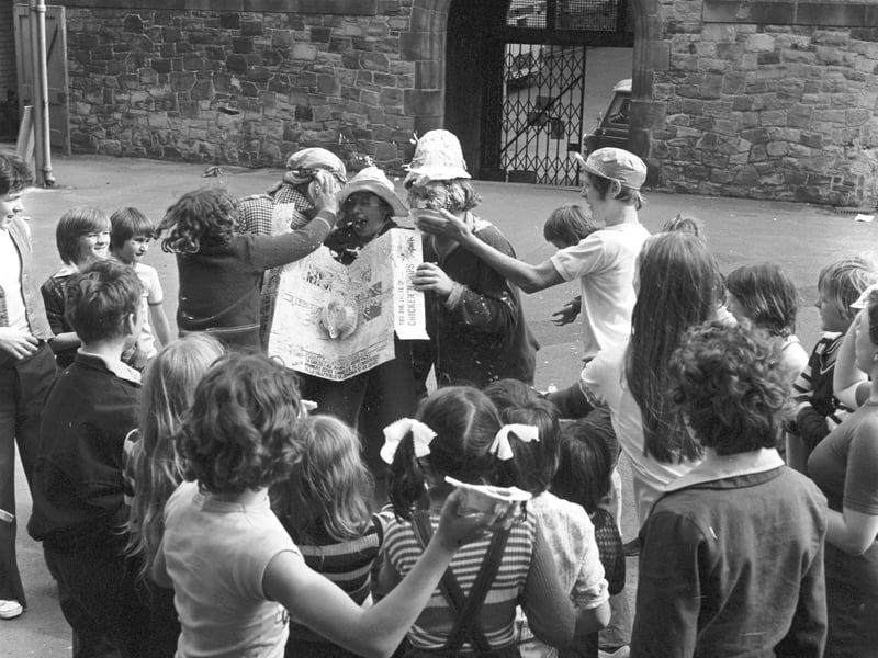 Dumbiedykes & South Side playscheme at James Clark school Edinburgh in August 1976 - playscheme leaders get covered in custard pies.