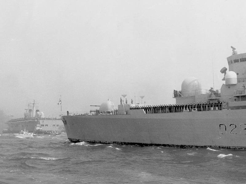 The Type 82 destroyer HMS Bristol returns to Portsmouth at the end of the Falklands war with HMS Invincible in the background