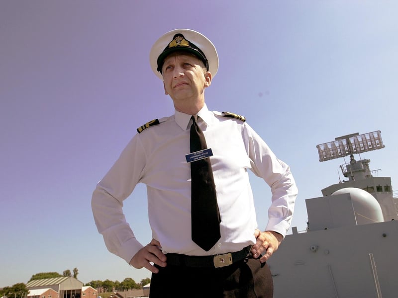 LT CDR. TIM GIBSON - Commanding Officer of HMS Bristol alongside at Whale Island, HMS Excellent, in 2001.